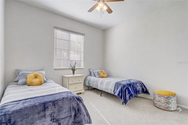 1900 NW 57th Ct, Ocala, FL 34482 - carpeted bedroom featuring baseboards and ceiling fan