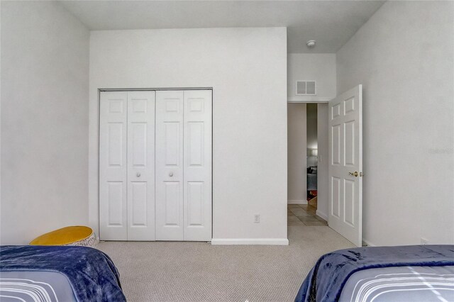 1900 NW 57th Ct, Ocala, FL 34482 - bedroom with carpet, baseboards, and a closet