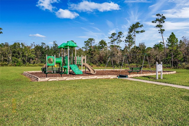 community playground featuring a yard