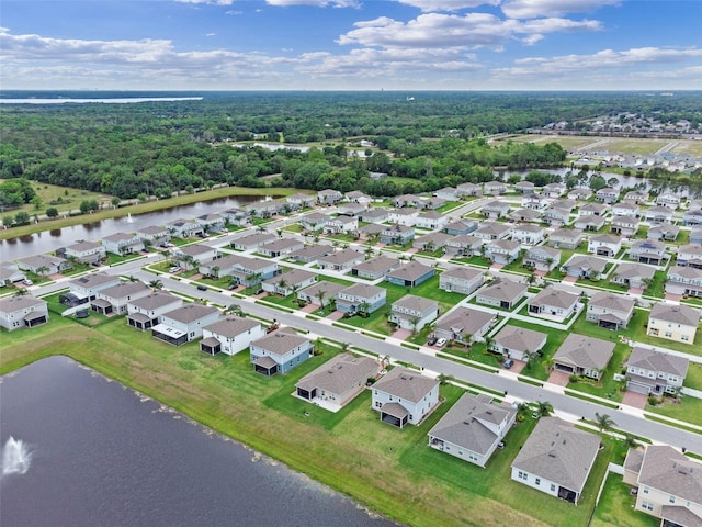 bird's eye view with a water view and a residential view