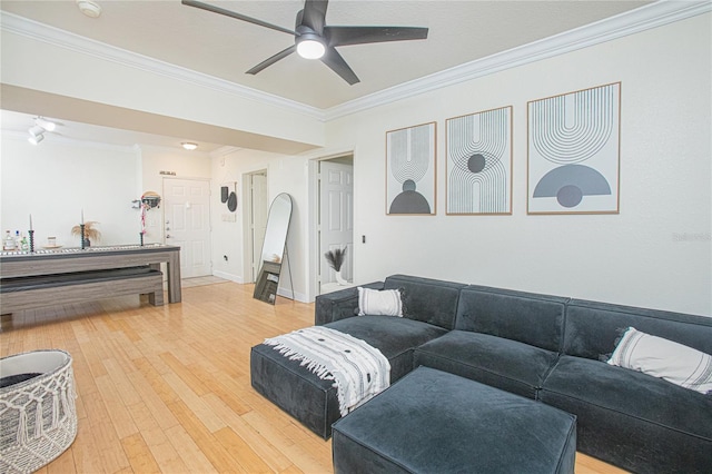 204 E S St Unit 2061, Orlando, FL 32801 - living area featuring crown molding, ceiling fan, and light wood-type flooring