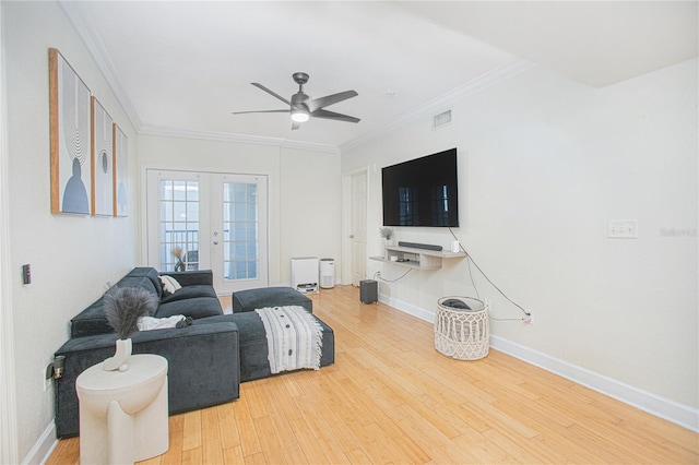 204 E S St Unit 2061, Orlando, FL 32801 - living room with ceiling fan, french doors, visible vents, wood finished floors, and ornamental molding
