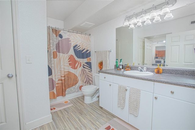 204 E S St Unit 2061, Orlando, FL 32801 - bathroom with vanity, a shower with shower curtain, toilet, and visible vents