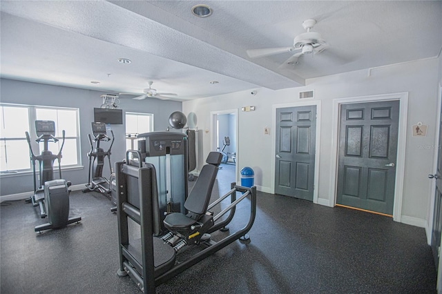 204 E S St Unit 2061, Orlando, FL 32801 - gym featuring baseboards, a ceiling fan, a textured ceiling, and visible vents