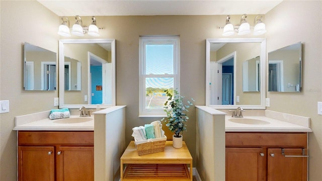 bathroom featuring two vanities
