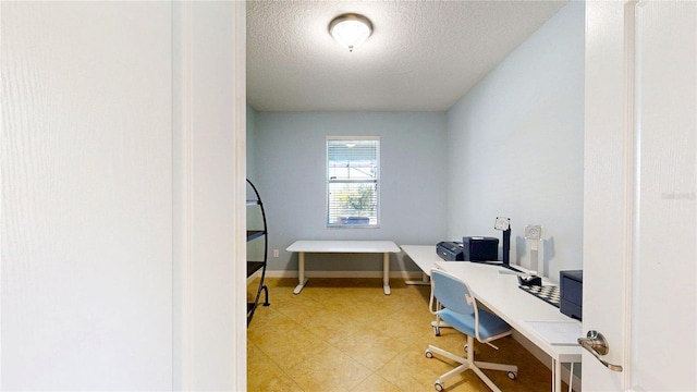 office featuring a textured ceiling