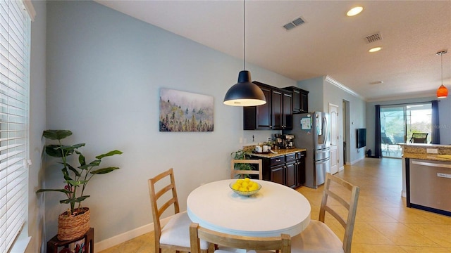 dining space with recessed lighting, baseboards, light tile patterned floors, ornamental molding, and inlaid floor details