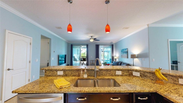 kitchen featuring a sink, open floor plan, dishwasher, ornamental molding, and light stone countertops