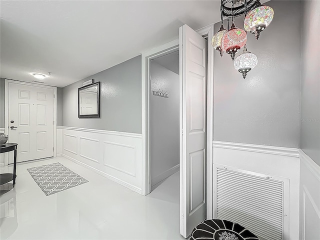 1150 Carmel Cir Unit 301, Casselberry, FL 32707 - interior space featuring a decorative wall and a wainscoted wall
