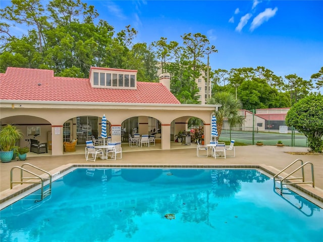 1150 Carmel Cir Unit 301, Casselberry, FL 32707 - pool with a patio and fence