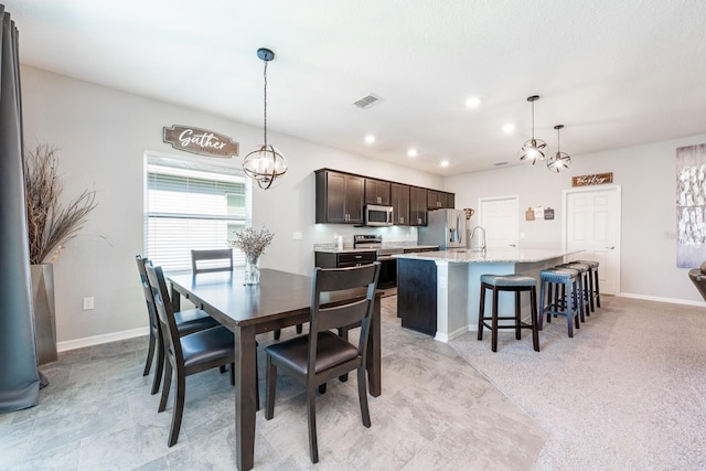 4231 Swan St, Haines City, FL 33844 - dining space with visible vents, baseboards, recessed lighting, and a chandelier