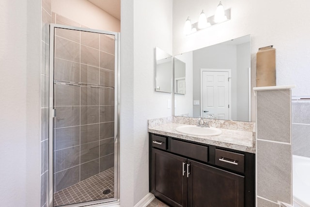 4231 Swan St, Haines City, FL 33844 - bathroom with a tub to relax in, a shower stall, and vanity