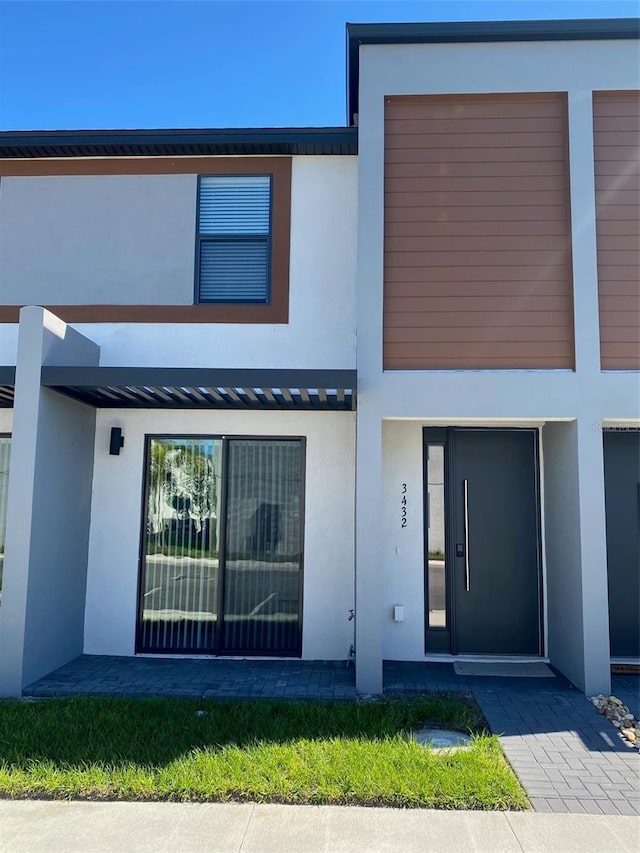 3432 Tranquil Trl, Kissimmee, FL 34747 - view of front facade with stucco siding