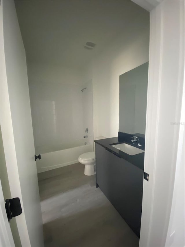 3432 Tranquil Trl, Kissimmee, FL 34747 - bathroom with vanity, toilet, shower / tub combination, and wood finished floors