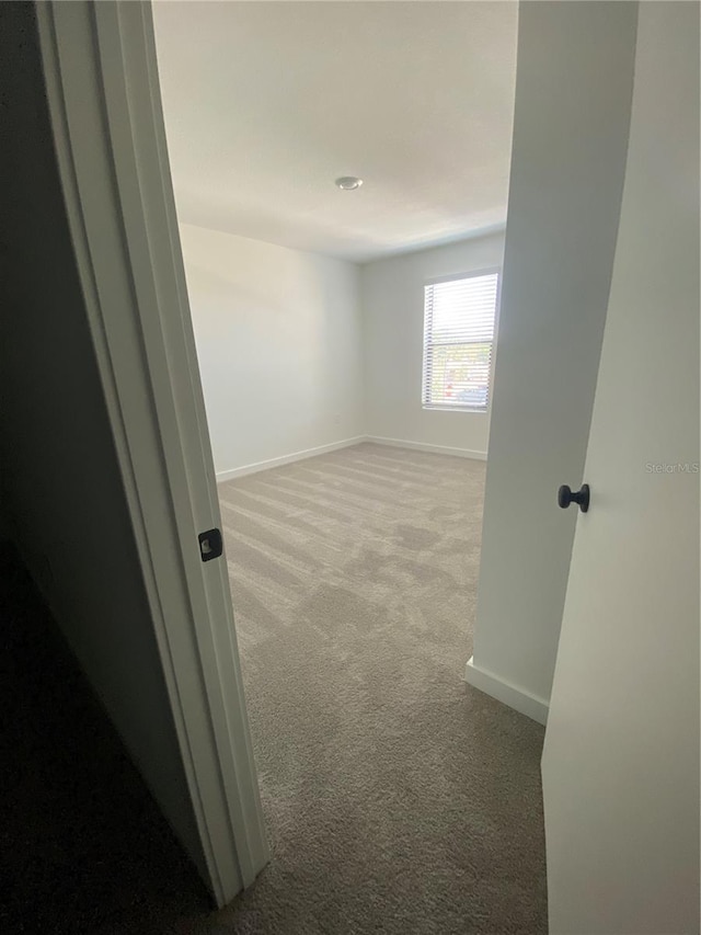 3432 Tranquil Trl, Kissimmee, FL 34747 - empty room featuring carpet and baseboards