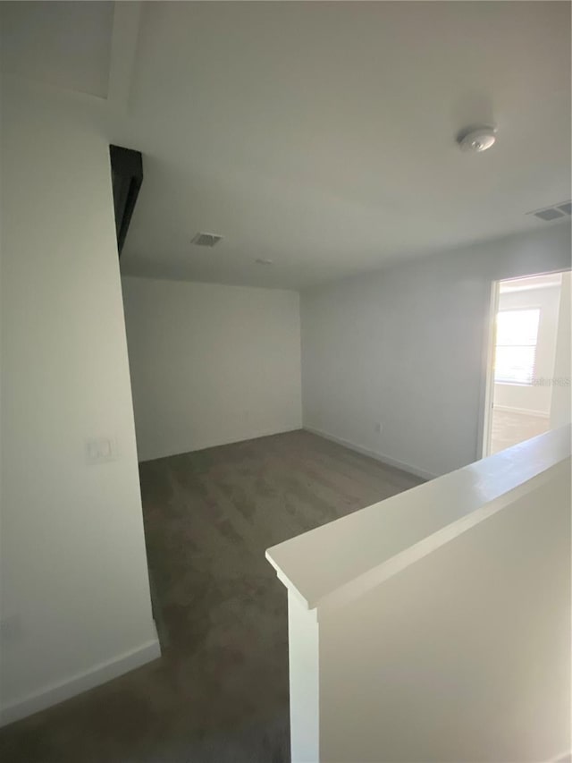 3432 Tranquil Trl, Kissimmee, FL 34747 - corridor featuring carpet and baseboards