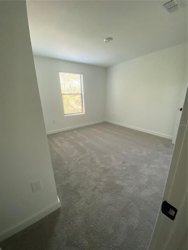 3432 Tranquil Trl, Kissimmee, FL 34747 - carpeted empty room featuring baseboards