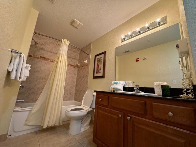 8125 Resort Village Dr Unit 51006, Orlando, FL 32821 - bathroom with shower / tub combo with curtain, toilet, tile patterned floors, a textured ceiling, and visible vents