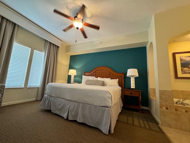 8125 Resort Village Dr Unit 51006, Orlando, FL 32821 - carpeted bedroom with baseboards, ceiling fan, and a textured ceiling