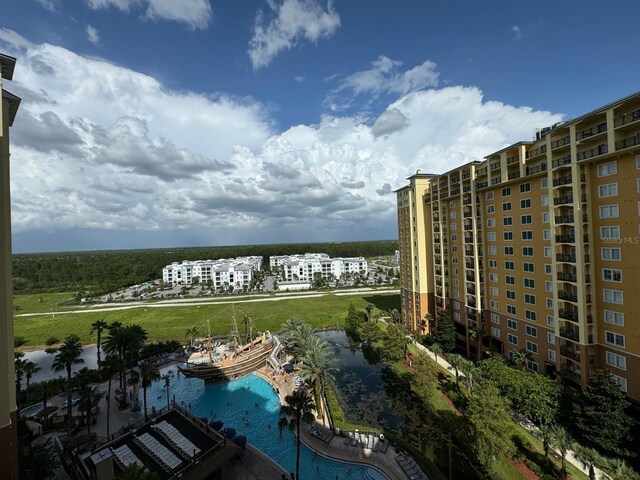 8125 Resort Village Dr Unit 51006, Orlando, FL 32821 - birds eye view of property featuring a water view