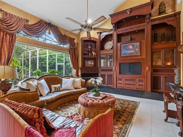 tiled living room featuring built in features and ceiling fan