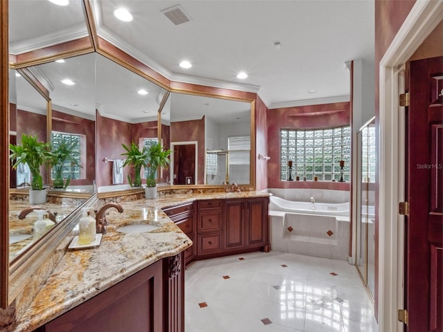 bathroom featuring crown molding, a wealth of natural light, a bath, visible vents, and a stall shower