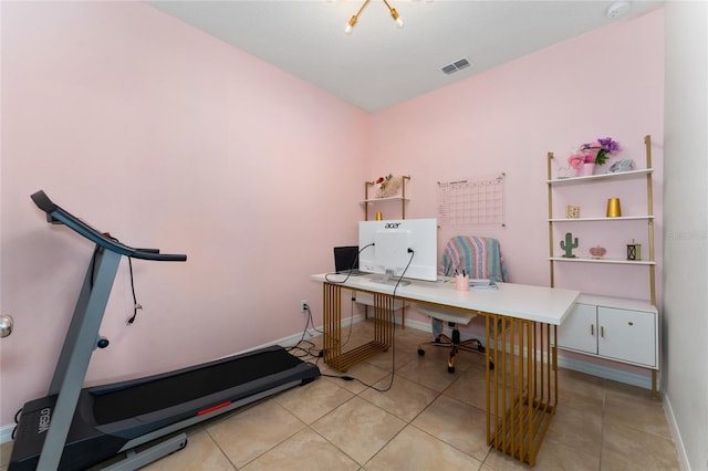 home office with light tile patterned floors, baseboards, and visible vents