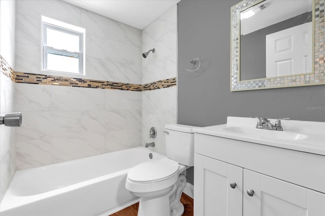 full bathroom with toilet, wood finished floors, vanity, and bathtub / shower combination