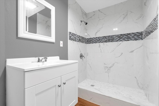 bathroom featuring vanity and walk in shower