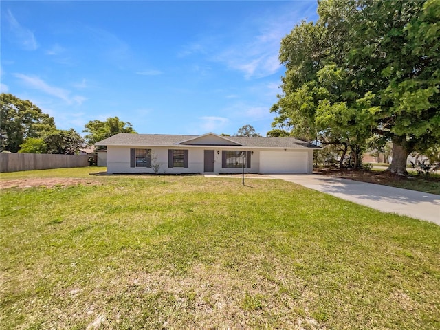 single story home with a front yard, an attached garage, fence, stucco siding, and driveway