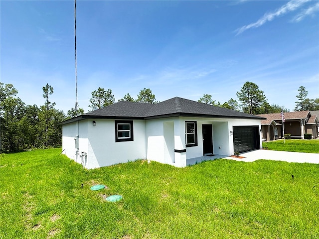 977 W Anderson Ln, Citrus Springs, FL 34434 - view of front of property with stucco siding, concrete driveway, an attached garage, and a front yard
