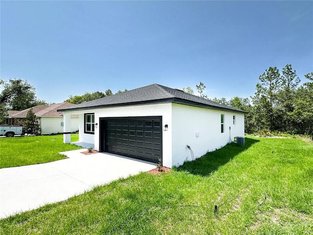 977 W Anderson Ln, Citrus Springs, FL 34434 - view of side of home with stucco siding, an attached garage, driveway, and a lawn