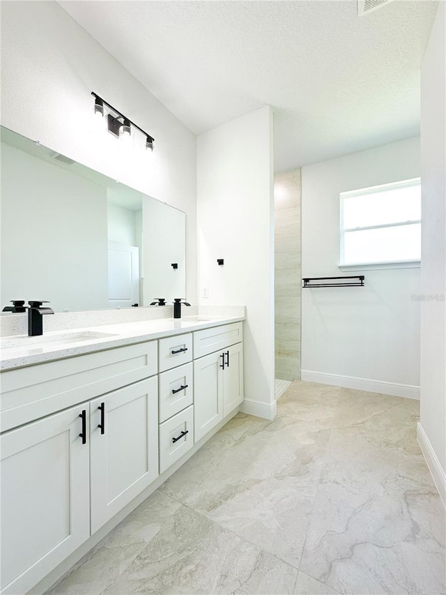 977 W Anderson Ln, Citrus Springs, FL 34434 - full bath featuring double vanity, baseboards, and a walk in shower