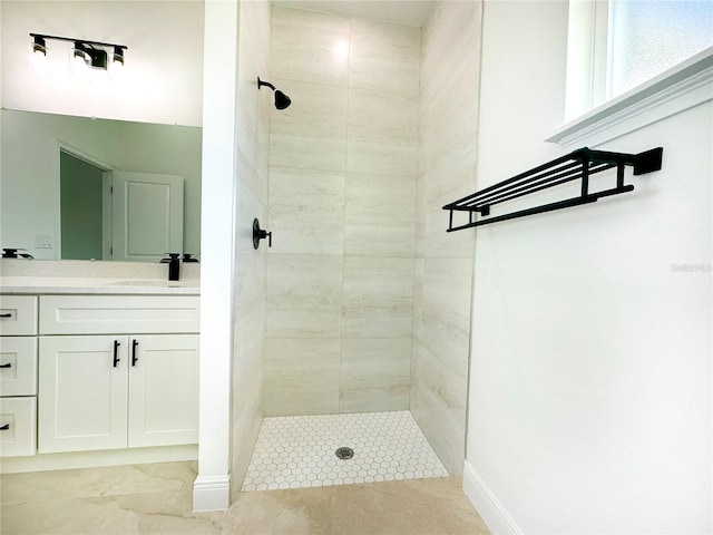 977 W Anderson Ln, Citrus Springs, FL 34434 - full bath with a tile shower, vanity, and baseboards