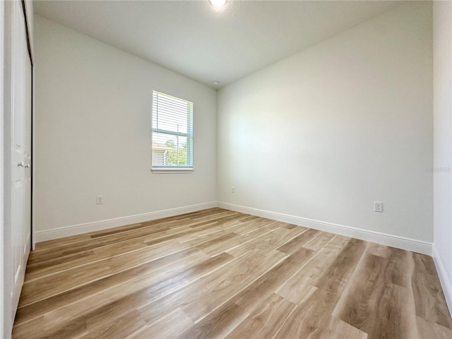 977 W Anderson Ln, Citrus Springs, FL 34434 - empty room featuring light wood-type flooring and baseboards