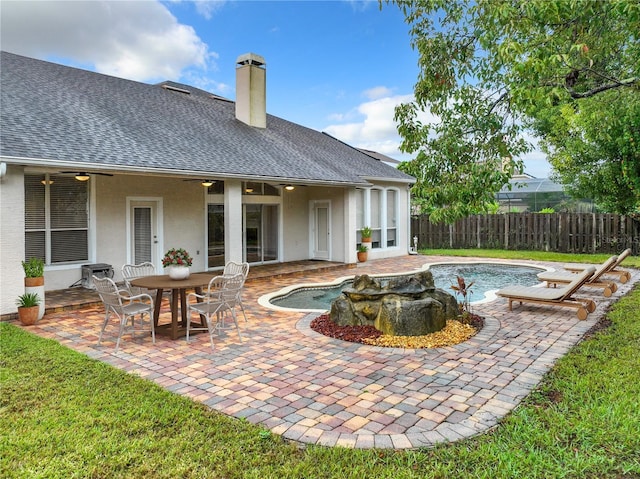 10915 Piping Rock Cir, Orlando, FL 32817 - view of swimming pool featuring a fenced in pool, a patio area, and fence