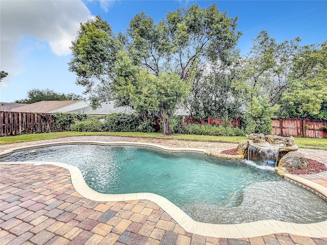 10915 Piping Rock Cir, Orlando, FL 32817 - view of swimming pool with a fenced in pool, a patio area, and a fenced backyard