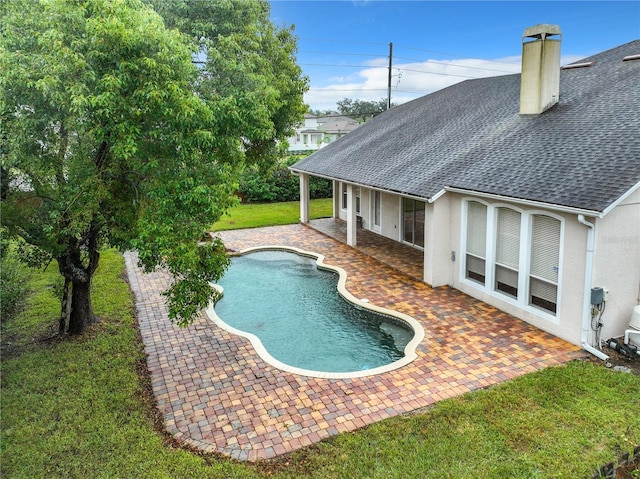 10915 Piping Rock Cir, Orlando, FL 32817 - outdoor pool featuring a patio area and a lawn