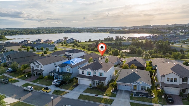 13323 Blossom Valley Dr, Clermont, FL 34711 - birds eye view of property featuring a water view and a residential view