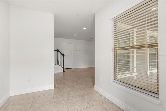 10866 Sunset Ridge Ln, Orlando, FL 32832 - hallway featuring recessed lighting, tile patterned floors, stairway, and baseboards