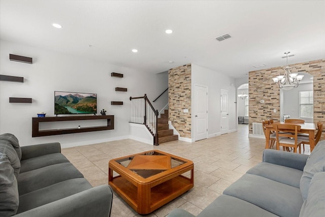 10866 Sunset Ridge Ln, Orlando, FL 32832 - living area featuring an inviting chandelier, visible vents, recessed lighting, stairway, and light tile patterned flooring