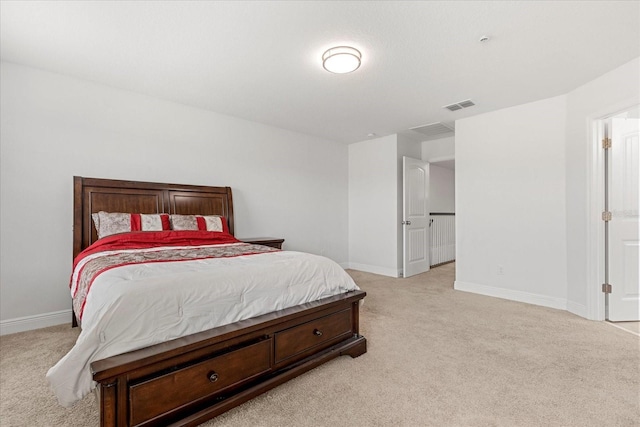 10866 Sunset Ridge Ln, Orlando, FL 32832 - bedroom featuring light carpet, baseboards, and visible vents