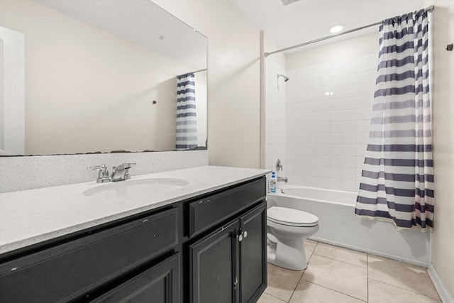 542 Patton Loop, Bartow, FL 33830 - bathroom featuring toilet, vanity, shower / bath combo with shower curtain, tile patterned floors, and recessed lighting