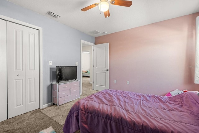 542 Patton Loop, Bartow, FL 33830 - bedroom featuring light colored carpet, ceiling fan, a closet, and baseboards