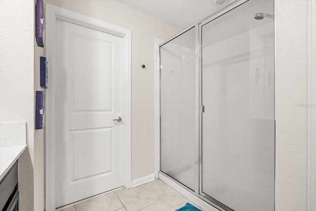542 Patton Loop, Bartow, FL 33830 - full bath with a shower stall, vanity, and tile patterned flooring