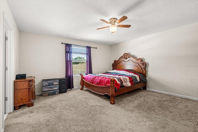 542 Patton Loop, Bartow, FL 33830 - carpeted bedroom featuring a ceiling fan, baseboards, and a textured ceiling