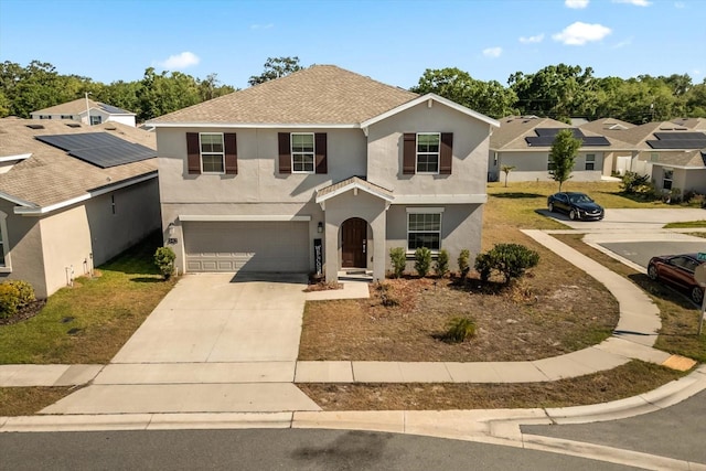 542 Patton Loop, Bartow, FL 33830 - traditional home featuring an attached garage, stucco siding, driveway, and a shingled roof