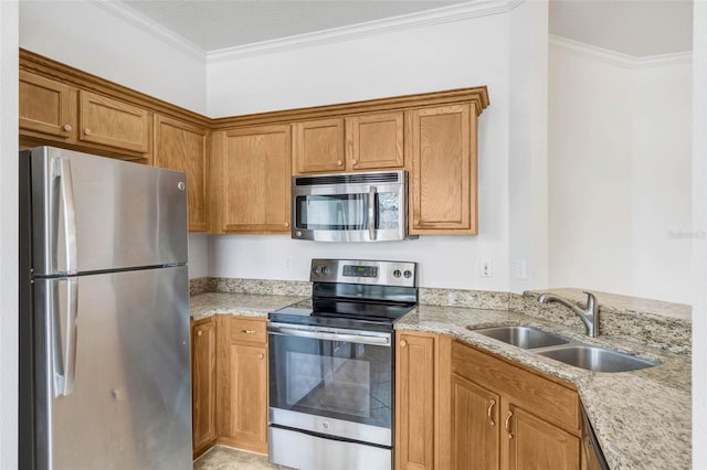 7762 Newlan Dr, Orlando, FL 32818 - kitchen featuring a sink, ornamental molding, light stone countertops, and stainless steel appliances
