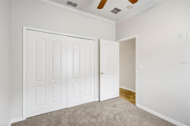 7762 Newlan Dr, Orlando, FL 32818 - unfurnished bedroom with visible vents, crown molding, and carpet floors