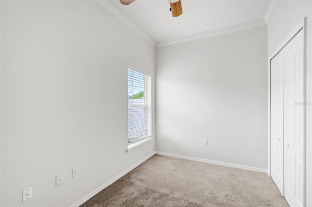 7762 Newlan Dr, Orlando, FL 32818 - unfurnished bedroom featuring ornamental molding, carpet floors, and baseboards